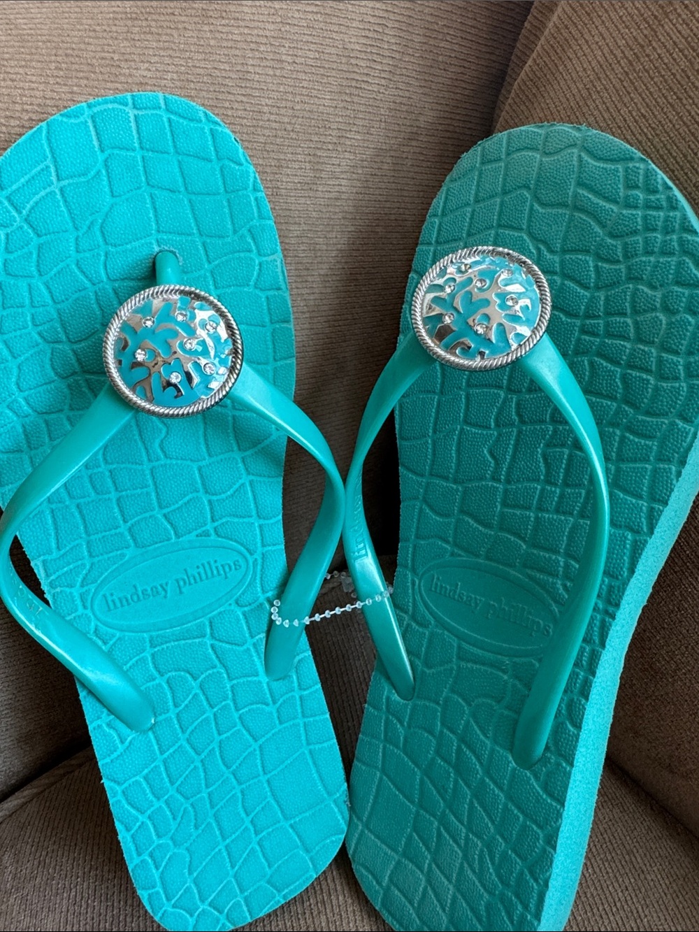lindsay phillips Turquoise Jelly Flip Flop Sandals with Silver Medallions